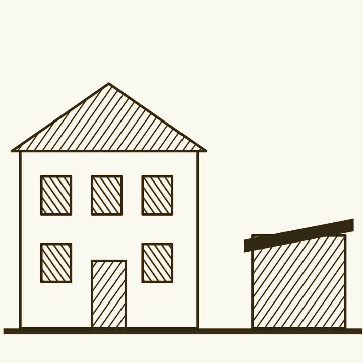 A large house with a small wooden shed standing beside it