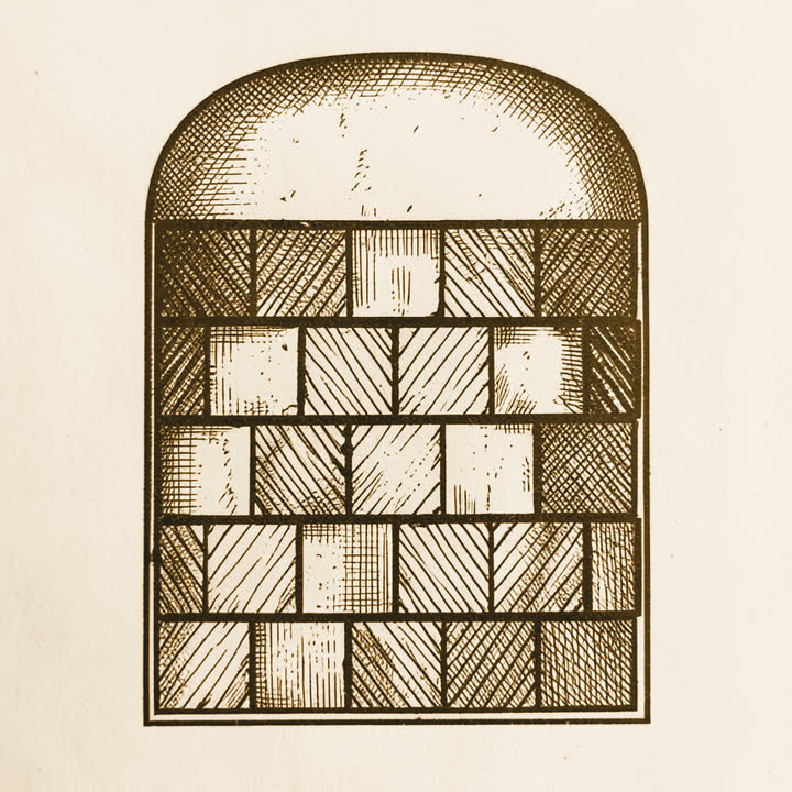 An old window made of small uneven panes set in rows
