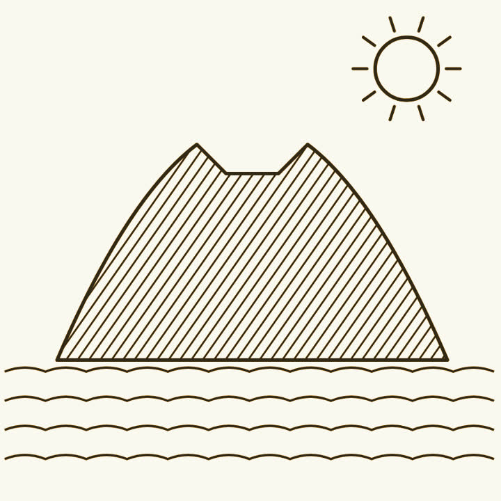 A small steep volcanic island with a crater on top, standing alone in the sea