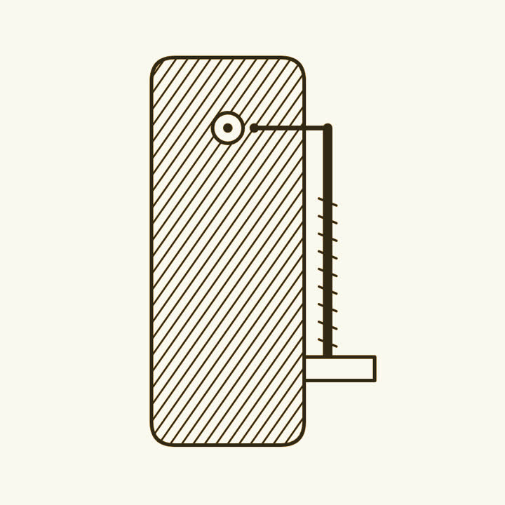 A small flat metal plate with a pinhead lens and a pin on a threaded rod to hold a specimen
