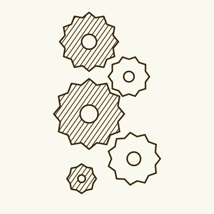 A tall column of interlocking brass gear wheels