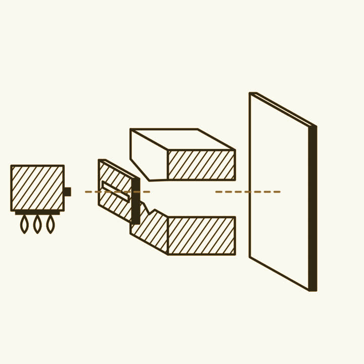 An oven of silver, a slit, a magnet with a ridged top pole and a grooved bottom pole, and a blank glass plate