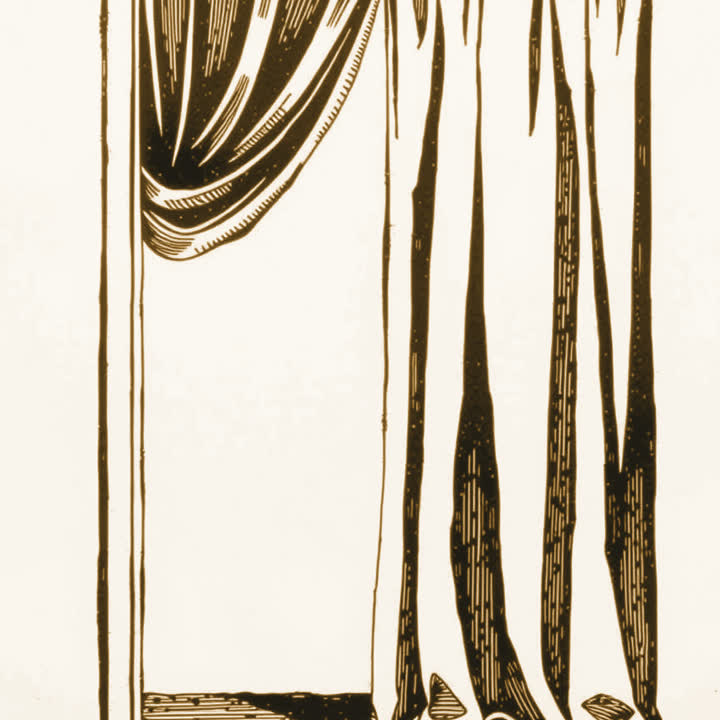A heavy curtain hanging closed right across a doorway, its folds falling to the floor